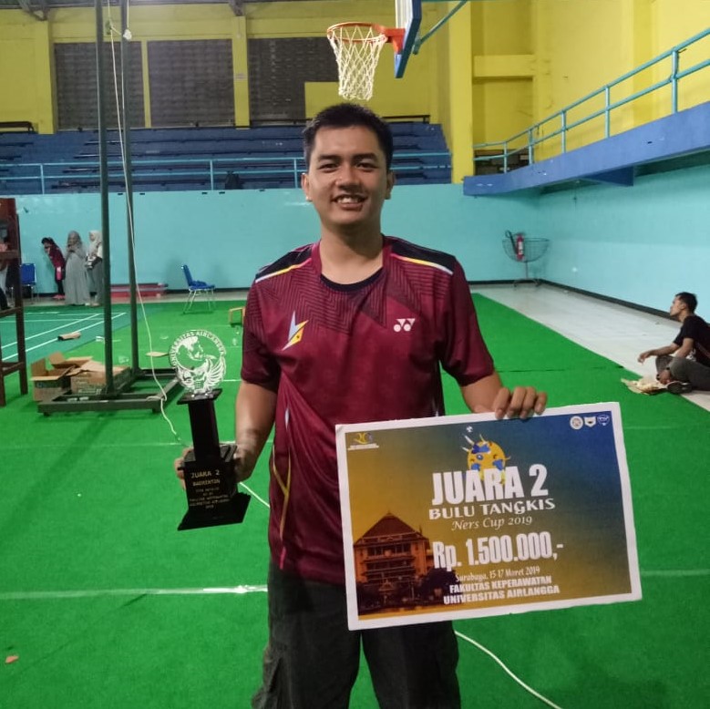 Achmad Yuskir wins second place in 2019 Ners Cup Badminton, at Universitas Airlangga Sports Hall.