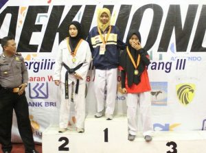 Arinda Nurhasanah (in the middle, dark blue jacket) wins first place and won a gold medal in Taekwondo Championship for Semarang Police Chief Perpetual Trophy on April 27-28, 2019.