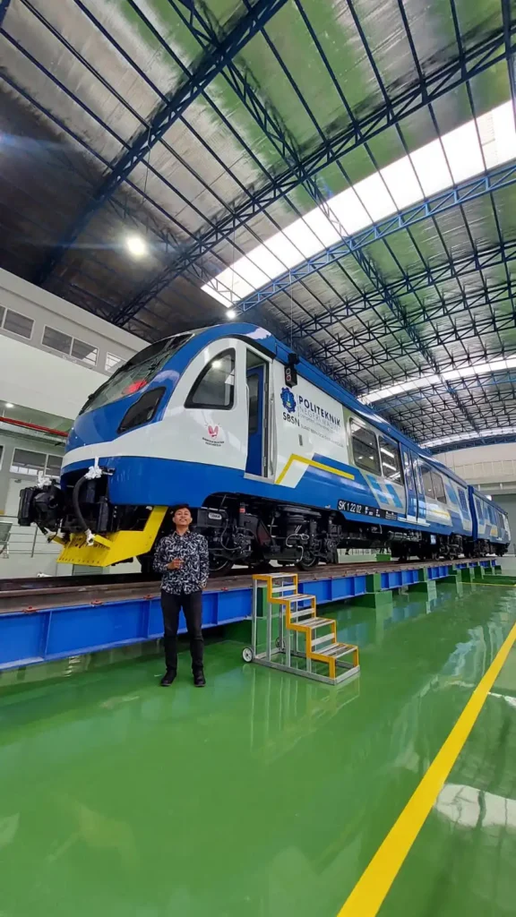Muhammad Rafi Athallah Jatmiko with one of the trains made by PT INKA (Photo: Rafi)