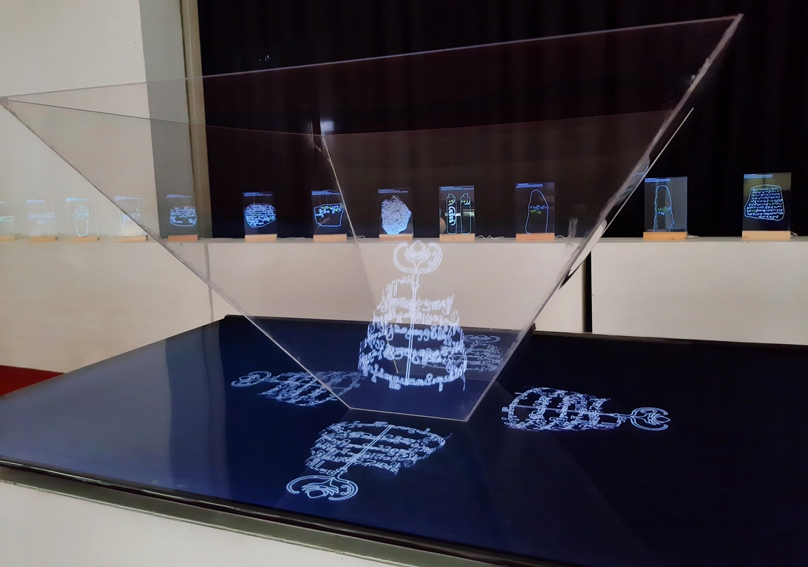 Holographic pyramid showing South Brahmic scripts exhibited during 13th ICAS at Balai Pemuda Surabaya from Sunday, July 28, 2024, to Thursday, August 1, 2024. (Photo: Icha Nur Imami Puspita)