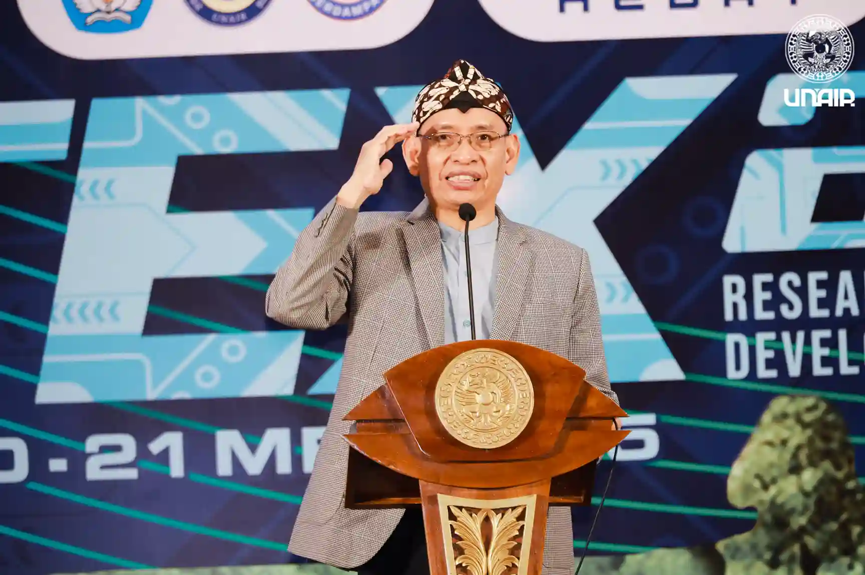 Prof. Dr. Mohammad Nasih, M.T., Ak., C.A., delivers remarks during HITEX 2025. (Photo: PKIP UNAIR)