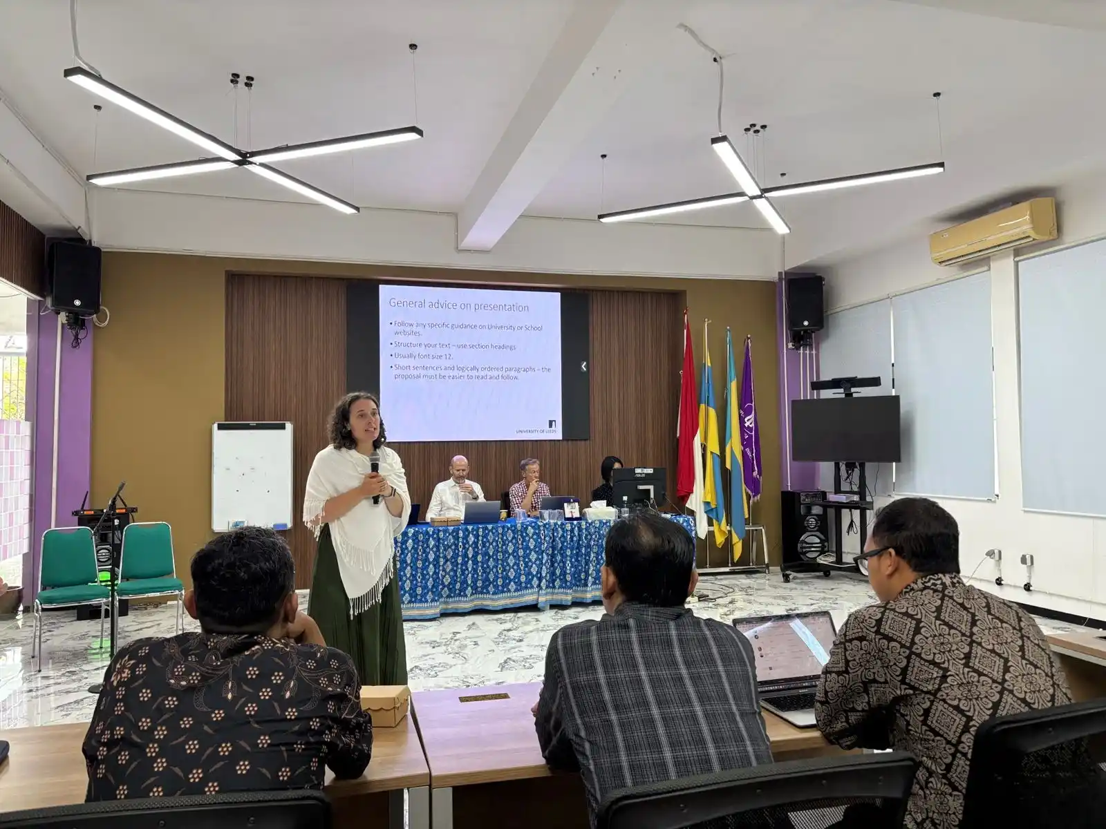 a speaker presents her material