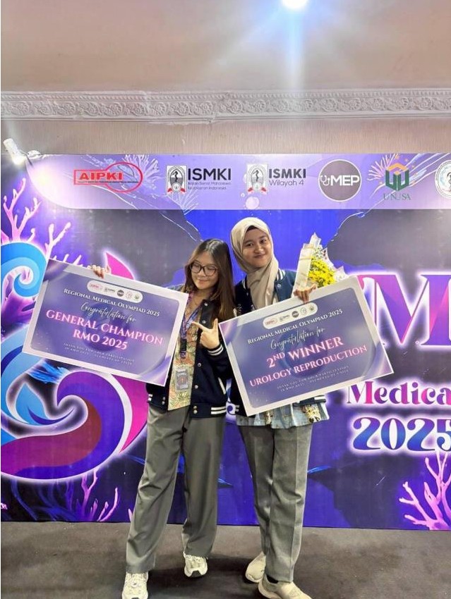 Emilda Puteri Aulia, bersama rekannya Michelle Angelina Ruslie meraih medali perak di cabang Uroreproductive System. (Foto: Narasumber)