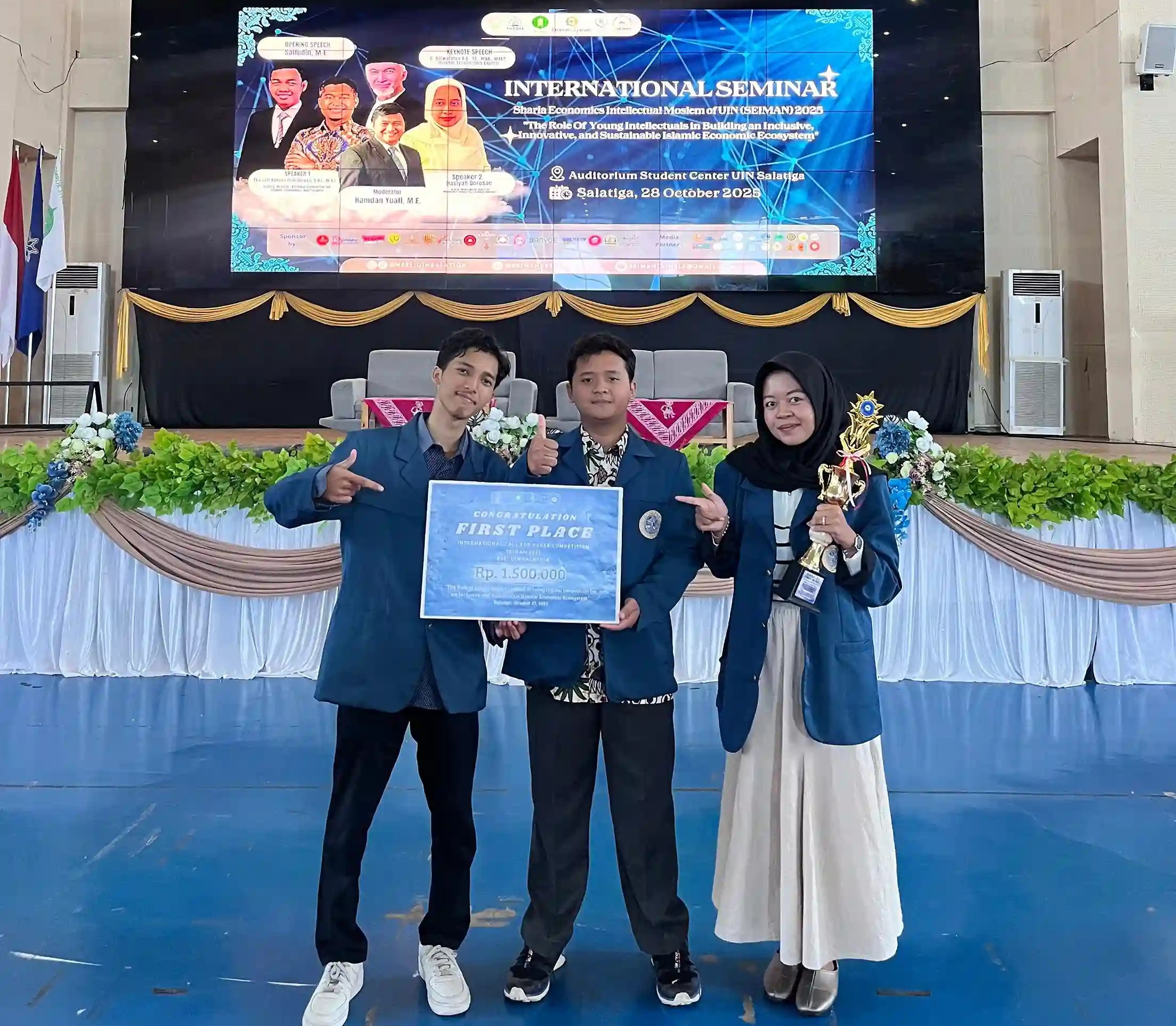 Cynthia Saphira Puteri, Muhammad Naufal Fauza, and Noka Al Jazera receive the First Place award at the 2025 International Paper Competition. (Photo: By courtesy)