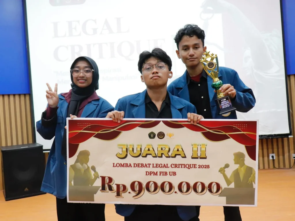 UNAIR International Relations (HI) team poses proudly after securing second place in the “Legal Critique” Debate at FIB UB (Photo: Source)