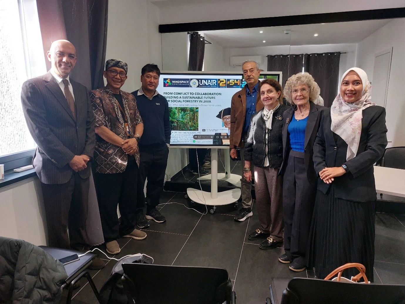 Prof. Dr. H. Mohammad Adib with several participants of “The Global Symposium on Earth–Environment–Energy–Food Sciences” after his presentation (Photo: By courtesy)