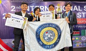Members of the UNAIR Economics student team pose after receiving awards at the International Student Summit 2026 in Malaysia. (Photo: By courtesy)