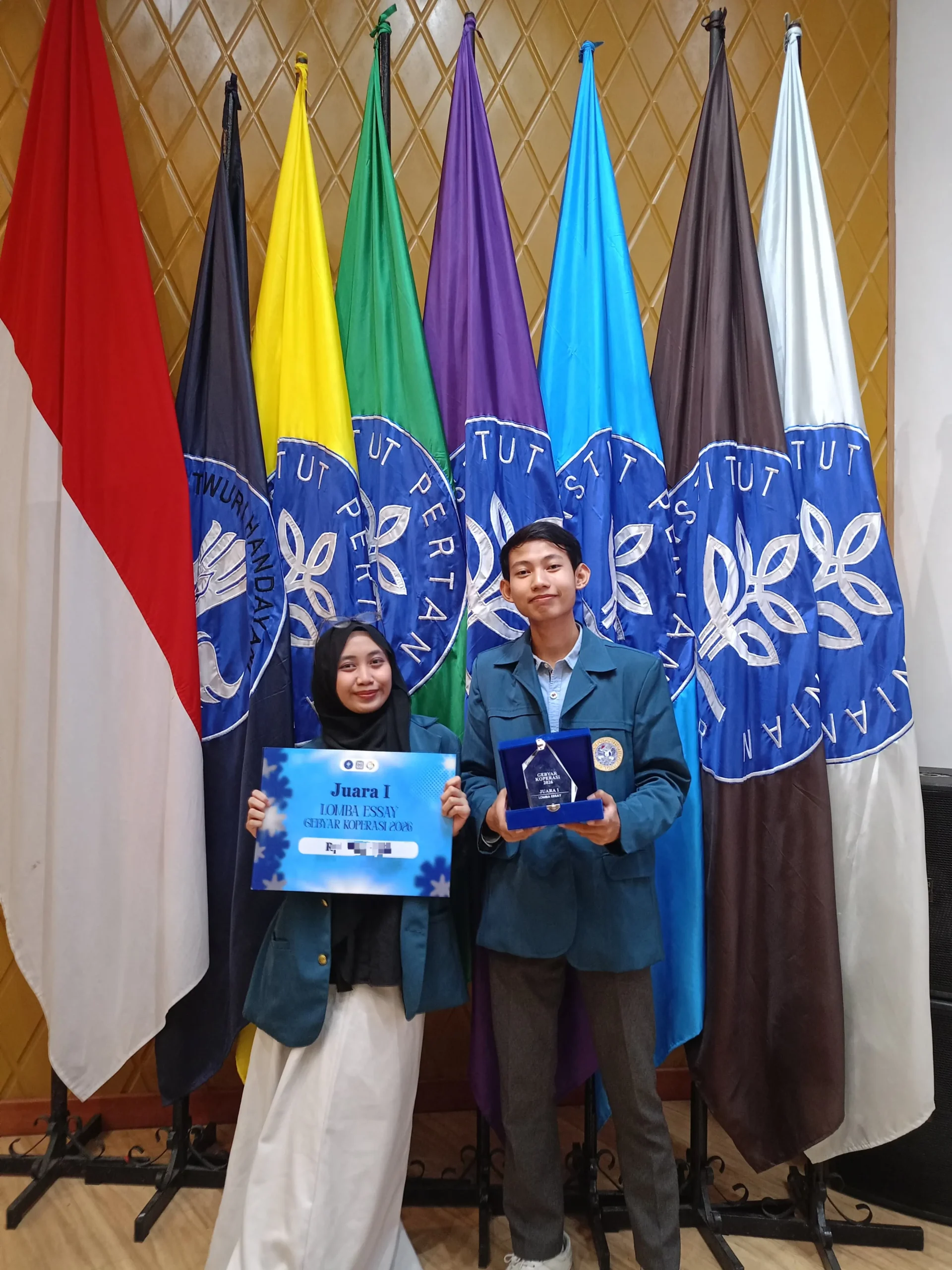 Anindya Zada Zahrani bersama Fadlan Abdulgani meraih juara 1 pada Lomba Essay Gebyar Koperasi 2026. (Foto: Istimewa)